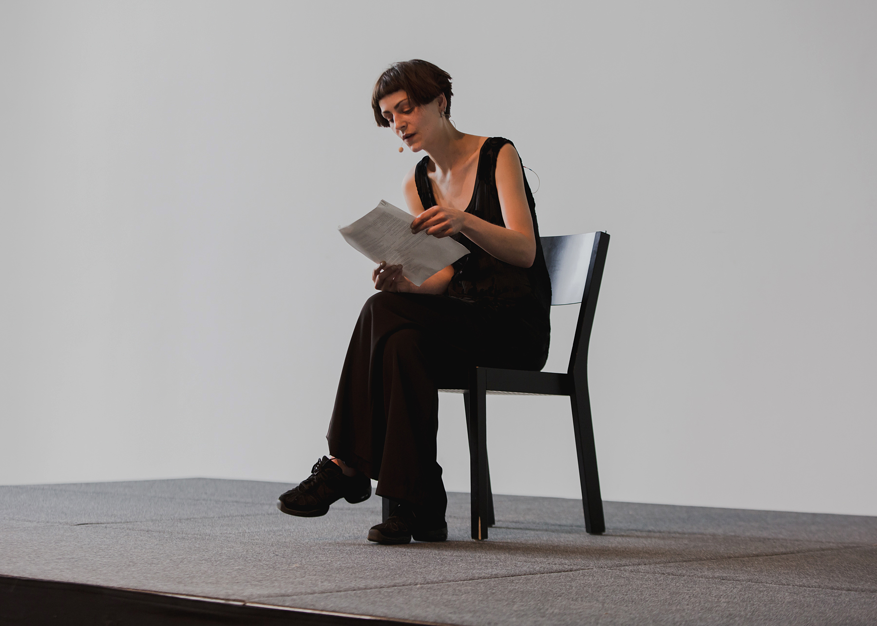 small orange book half blurry on pillow