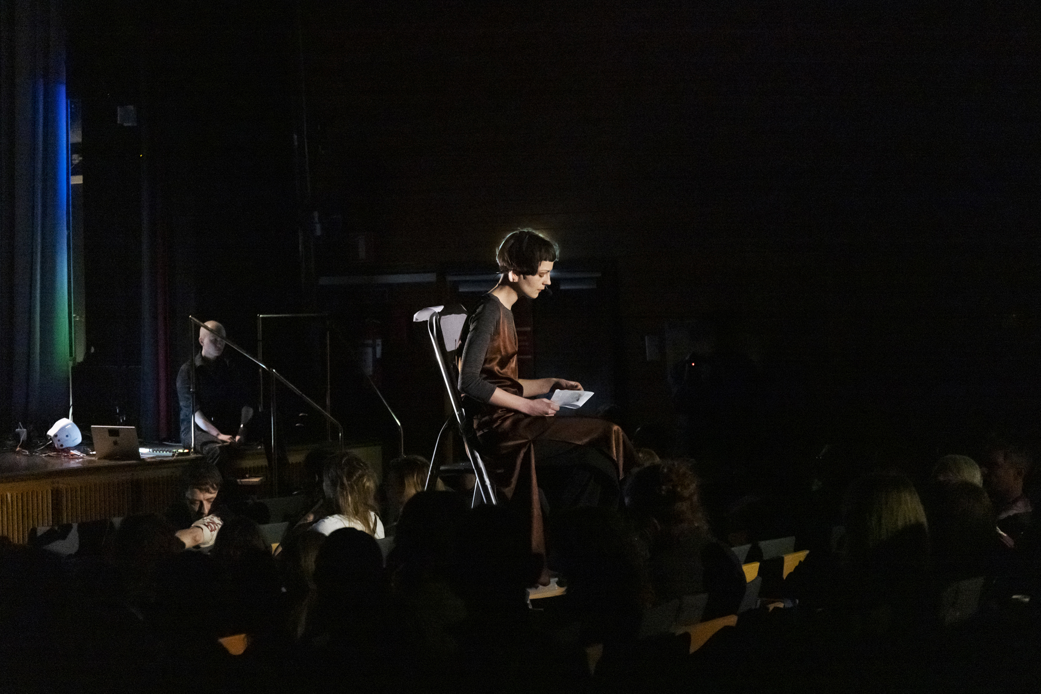 White Space with six speakers, three large windows, and bench